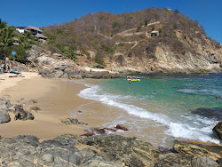 Photo de Playa Estacahuite avec petite baie