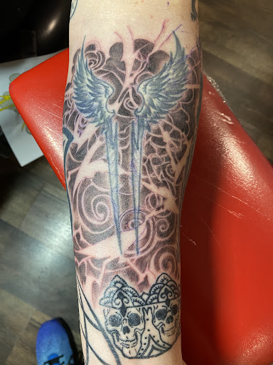 Explore spiral tattoo ideas, creative tattoo ideas in Walden, available at Hudson Valley House of Ink