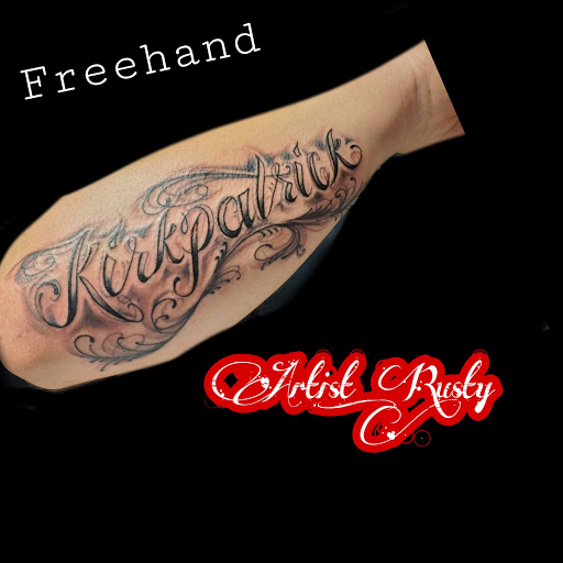 Explore red and black tattoo ideas, creative tattoo ideas in Florence, available at West Coast Tattoo & Body Piercing