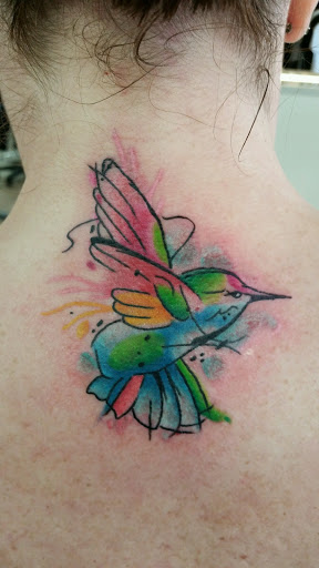 Explore women's leg tattoo ideas, creative tattoo ideas in Chicago, available at Royal Flesh Tattoo and Piercing