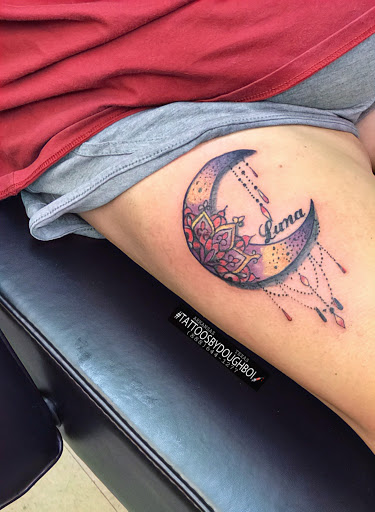 Explore female thigh tattoo ideas, creative tattoo ideas in Texarkana, available at Studio 11 Ink, Barber & Beauty