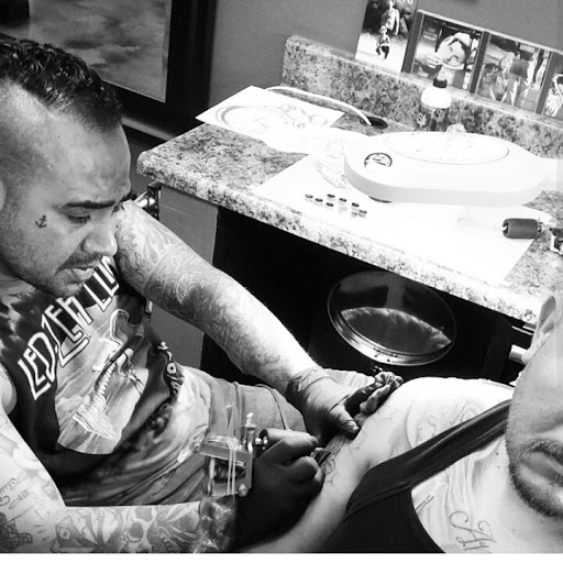 Explore bass guitar tattoo ideas, creative tattoo ideas in Garden Grove, available at Dr. Tattoo Studio