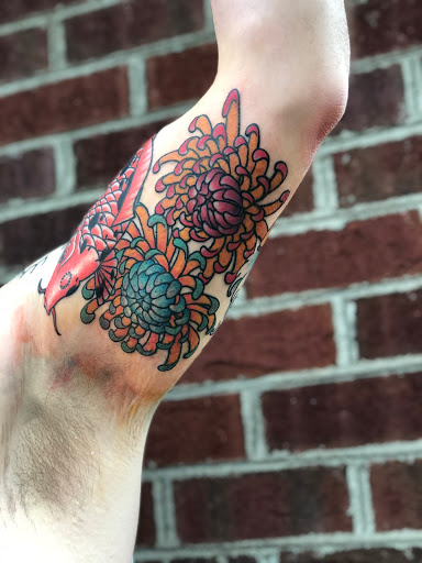 Explore mexican flag tattoo ideas, creative tattoo ideas in Sanford, available at Hudson & Company Tattoo Studio