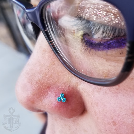 Explore neck tattoo ideas small, creative tattoo ideas in Kearney, available at Studio 5150 Piercing & Fine Jewelry