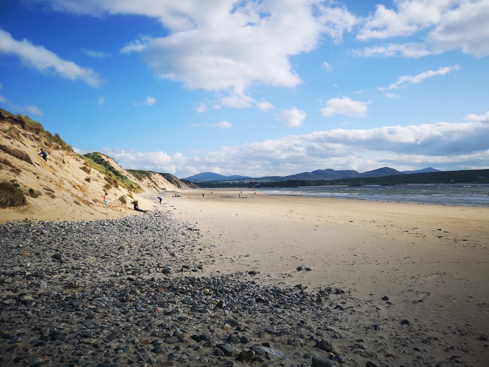 Foto van Five finger Beach met recht en lang