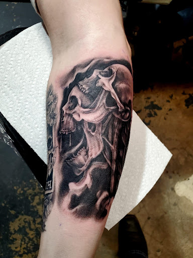 Explore tattoo ideas for men leg, creative tattoo ideas in Pineville, available at Epic Ink Studio