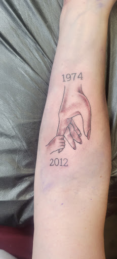 Explore may birth tattoo ideas, creative tattoo ideas in Las Vegas, available at Work of Art Tattoo and Piercing