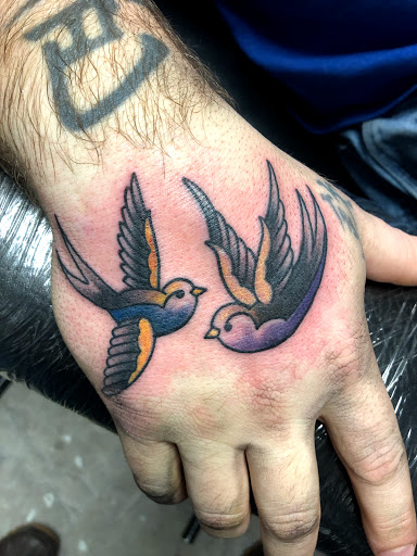 Find necklace tattoo ideas for your next unique tattoo in Hamden at Burning Hearts Tattoo Co.