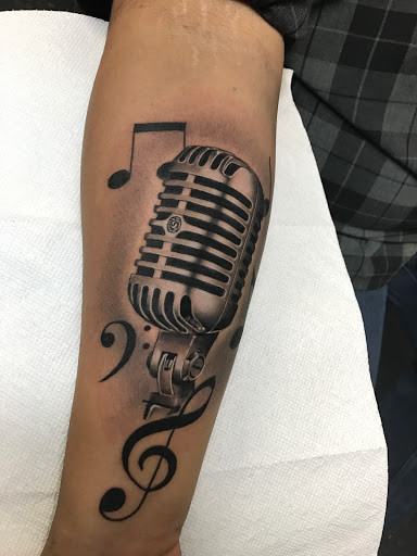 Explore 2 child tattoo ideas for dad, creative tattoo ideas in South Sioux City, available at True Devotion Tattoo Studio