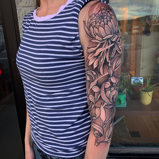 Explore wrist tattoo ideas for men, creative tattoo ideas in Rapid City, available at Pinup Parlor Tattoo Studio