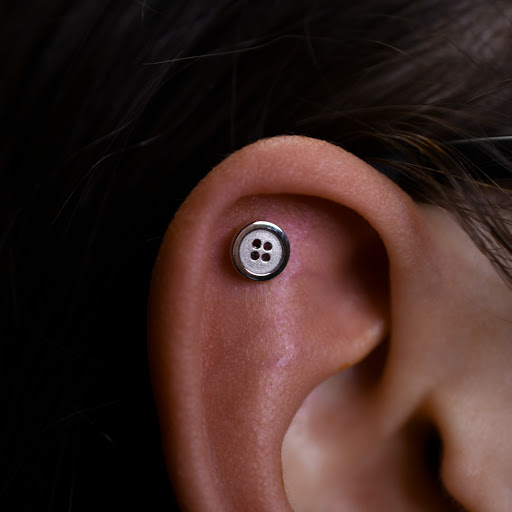 Explore japanese cherry blossom tattoo ideas, creative tattoo ideas in Reno, available at Black Hole Body Piercing