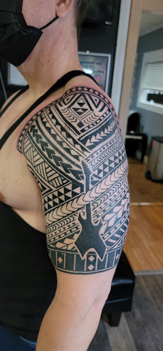 Explore small tattoo ideas for men arm, creative tattoo ideas in Coral Springs, available at Undertow Tattoo Studio