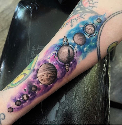 Explore forearm arm tattoo ideas, creative tattoo ideas in Clinton, available at Black Relic Tattoo