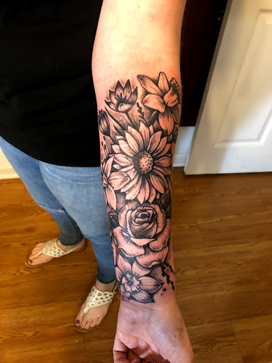 Explore sun tattoo ideas for men, creative tattoo ideas in Madison, available at ART IMMORTAL TATTOO