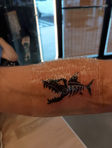 Explore music tattoo sleeve ideas, creative tattoo ideas in West Palm Beach, available at Wooden Heart Tattoos and Piercings