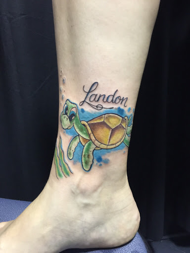 Explore flag tattoo ideas, creative tattoo ideas in Madison, available at ART IMMORTAL TATTOO