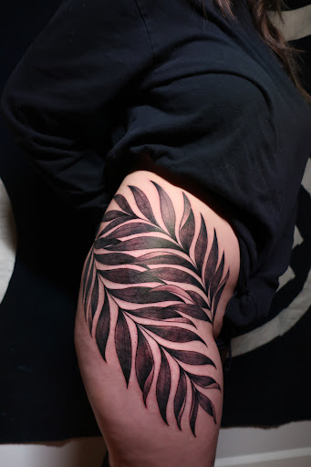 Explore thigh tattoo ideas male, creative tattoo ideas in Austin, available at Black Swan Tattoo Company
