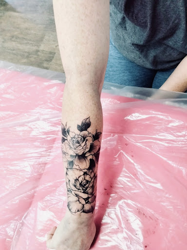 Explore gothic hand tattoo ideas, creative tattoo ideas in Lake City, available at Crooked Spines Tattoo Studio