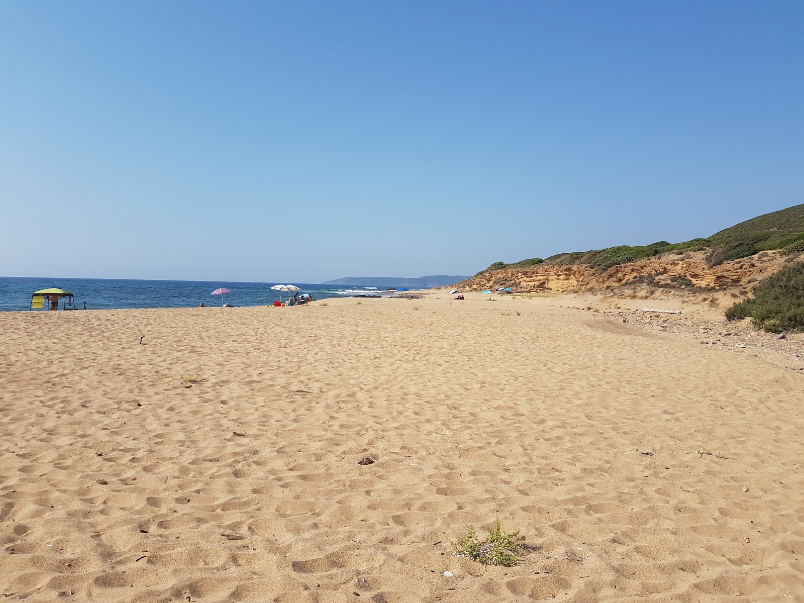 Spiaggia S'Acquedda'in fotoğrafı ve güzel manzarası