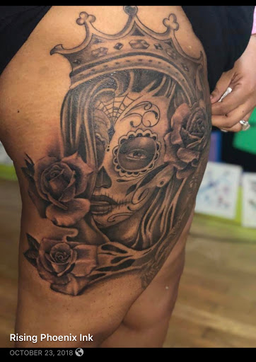 Explore roman numeral birthday tattoo ideas, creative tattoo ideas in Jamaica, available at Rising Phoenix Ink