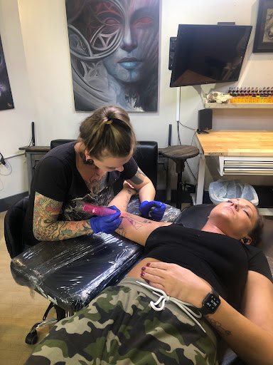 Explore black metal tattoo ideas, creative tattoo ideas in Fort Wayne, available at Grade A Tattoos and Body Piercing