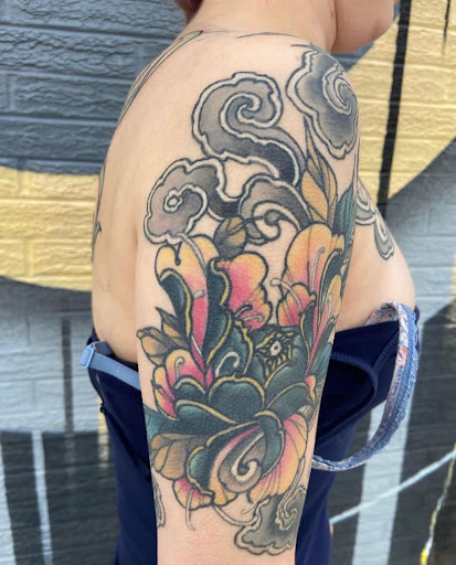 Explore badass neck tattoo ideas, creative tattoo ideas in Boulder, available at Claw and Talon Tattoo