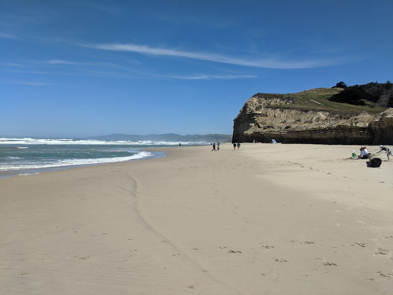 Foto av San Gregorio Beach med ljus sand yta