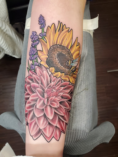 Explore red ink tattoo ideas for guys, creative tattoo ideas in Orem, available at Hearts and Hands Tattoo and Piercing