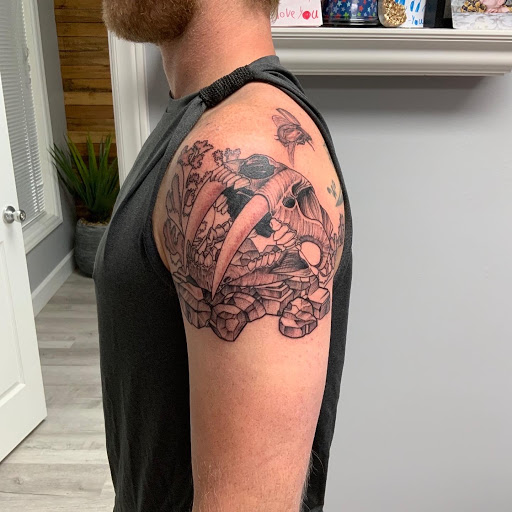 Explore skiing tattoo ideas, creative tattoo ideas in Wake Forest, available at Revelation Ink Tattoo and Piercing