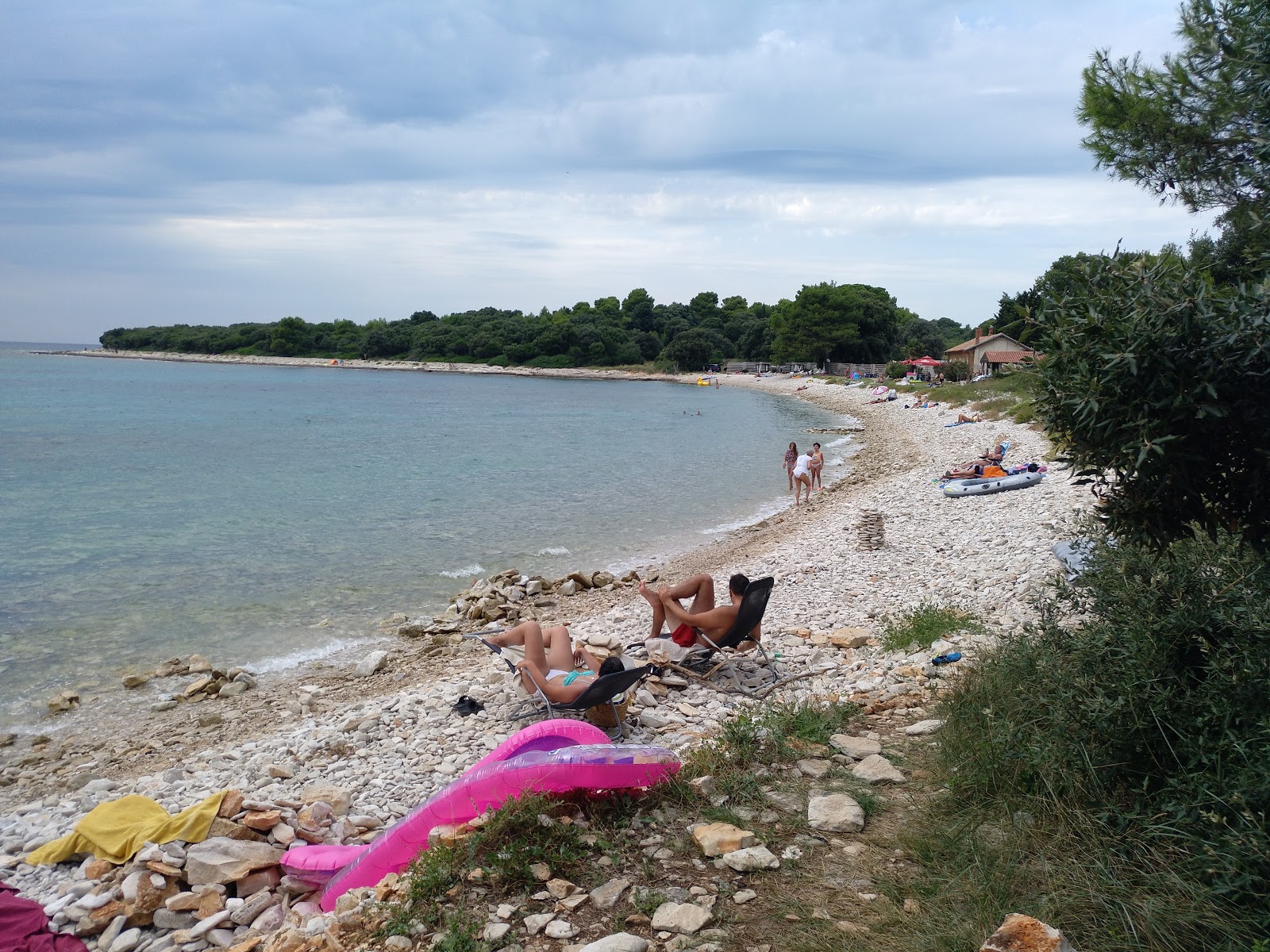 Fotografie cu Meneghetti beach - locul popular printre cunoscătorii de relaxare