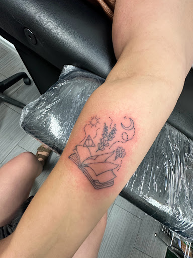 Explore mens upper back tattoo ideas, creative tattoo ideas in Peoria, available at The Ink Bar