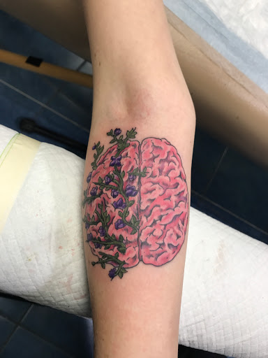 Explore rockstar tattoo ideas, creative tattoo ideas in Aurora, available at Ronin Tattoo Studio INC