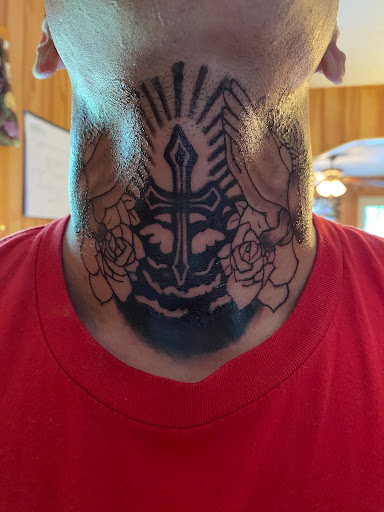 Explore name neck tattoo ideas, creative tattoo ideas in Rhinelander, available at Filling The VOID Tattoo Studio