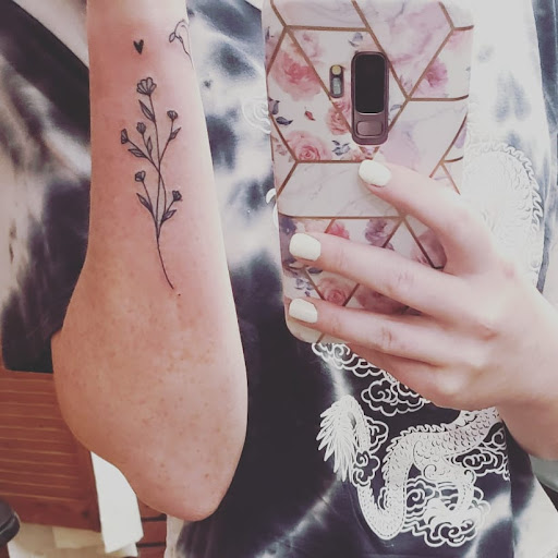 Find rib tattoo ideas for females for your next unique tattoo in Warner Robins at One Chance Tattoo and Piercing