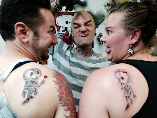 Explore book dragon tattoo ideas, creative tattoo ideas in Lake Havasu City, available at 303Tattoo
