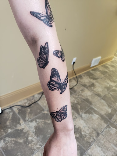 Explore hand print tattoo ideas, creative tattoo ideas in North Bend, available at The Rusty Needle Tattoo Parlor