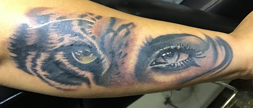 Explore free hand tattoo ideas, creative tattoo ideas in Angola, available at Hoodlum Ink