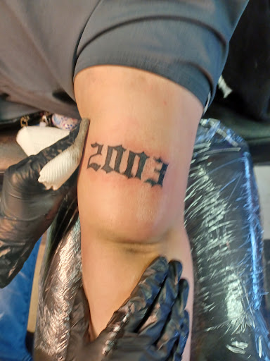 Explore headstone tattoo ideas, creative tattoo ideas in Owosso, available at Twisted ink tattoo