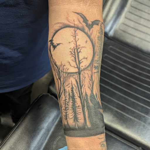 Explore january birth flower tattoo ideas, creative tattoo ideas in Spartanburg, available at The Gallery Tattoo Shop Spartanburg
