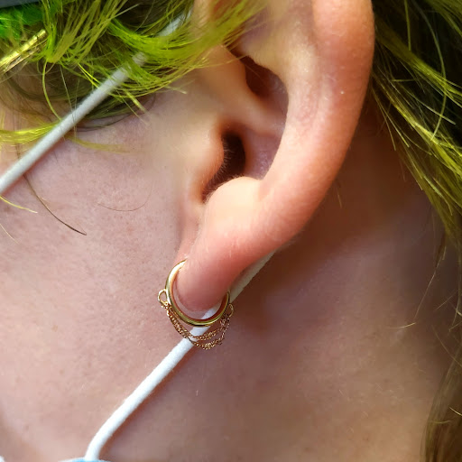 Find women's rib tattoo ideas for your next unique tattoo in Memphis at Rose Quartz Body Adornment LLC