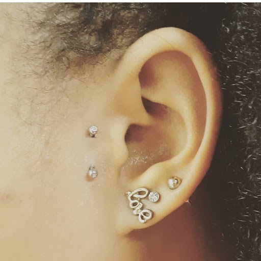 Explore womens chest tattoo ideas, creative tattoo ideas in Charleston, available at Exotic Impressions Body Piercing