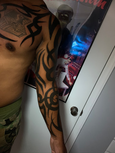 Explore swiss tattoo ideas, creative tattoo ideas in Greensboro, available at Tried and True Tattoo Company