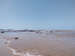 Foto von Maria Nenem Strand von Klippen umgeben