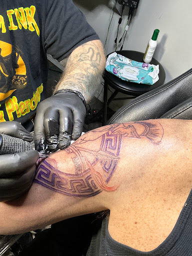 Explore winnie the pooh tattoo ideas, creative tattoo ideas in Angola, available at Hoodlum Ink