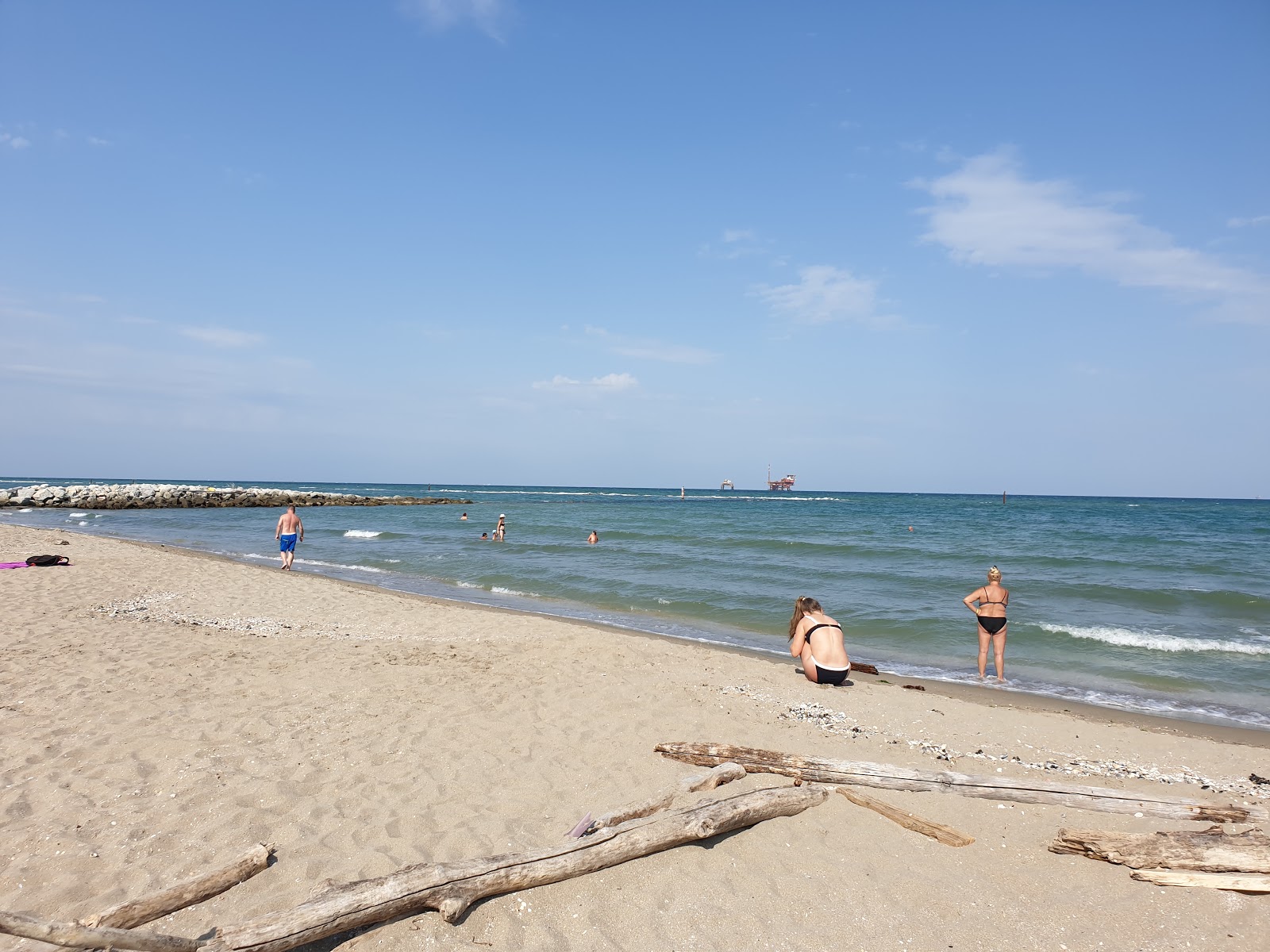 Foto av Spiaggia della Bassona med rymlig strand