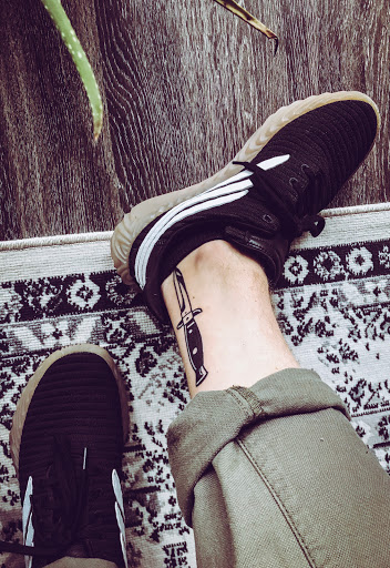 Explore mens quad tattoo ideas, creative tattoo ideas in Pittsburgh, available at Kyklops Tattoo