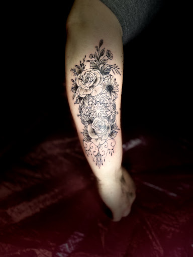 Explore tattoo name placement ideas, creative tattoo ideas in Lake City, available at Crooked Spines Tattoo Studio