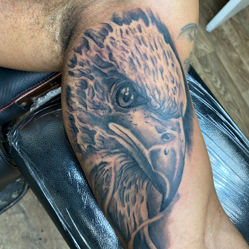 Explore dog tattoos ideas, creative tattoo ideas in Chattanooga, available at Chattanooga Tattoo Company