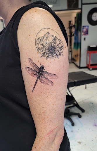 Find cardinal tattoo ideas for ladies for your next unique tattoo in Loogootee at The Inkspot Tattoo Shop LLC