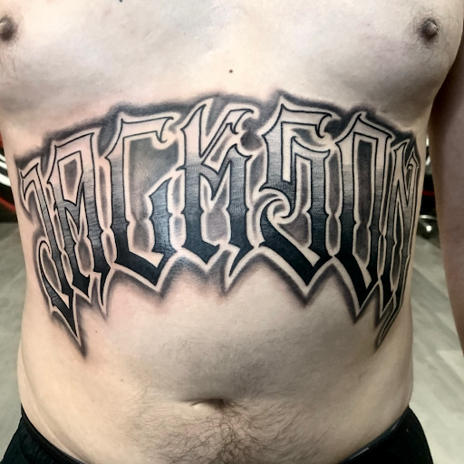 Explore scoliosis tattoo ideas, creative tattoo ideas in Silver City, available at Independent Ink Tattoo